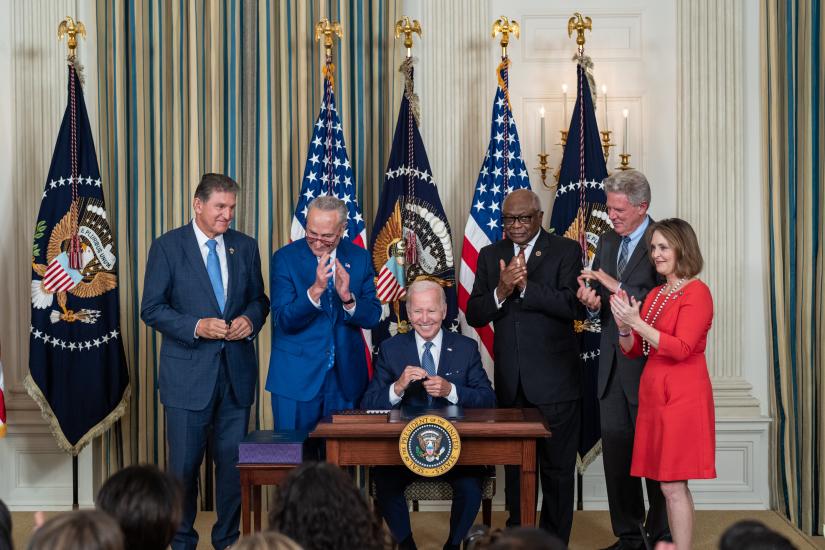 US President Joe Biden signs H.R. 5376, the ‘Inflation Reduction Act of 2022’, in the State Dining Room of the White House on August 16 2022 (Cameron Smith / White House)