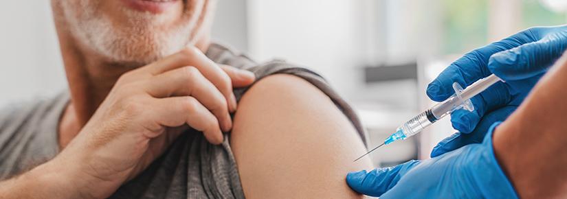 Photo of an elderly person getting vaccine