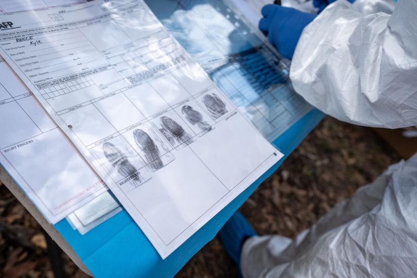 Fingerprint gathering as part of the exercise. Picture by Grainger Films