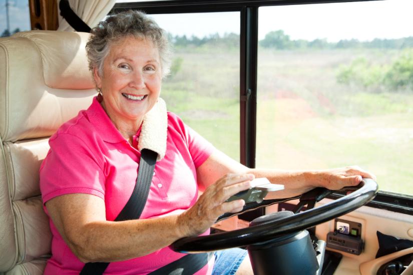 woman driving a motorhome. Adobe Stock