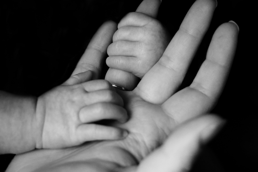 Parent and baby'shands