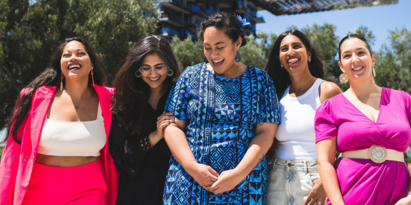 Five MWN members together laughing