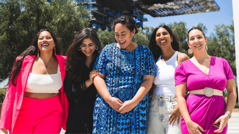 Five MWN members together laughing