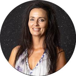 Mandy Richards smiling and looking at the camera