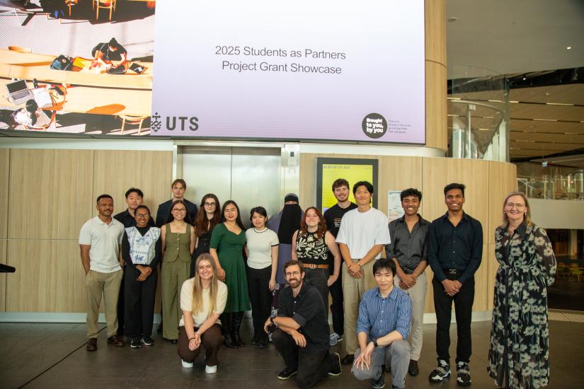 A group of Students from the Students as Partners program posed in a group photo with Professor Kylie Readman