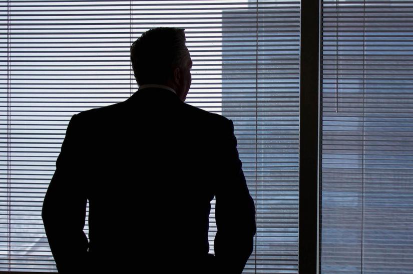 A business person in silhouette A business person in silhouette