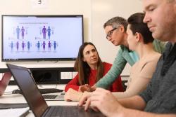 Students in genetic counselling class with teacher