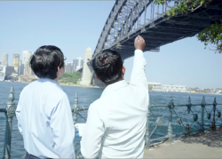 Bridge maintenance robot team looking at Harbour Bridge