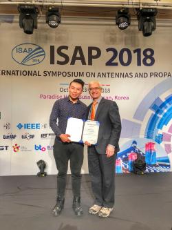 FEIT's Wei Lin receiving an ISAP Award