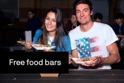 male and female student eating noodles together