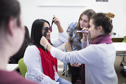 UST orthoptic students practicing 