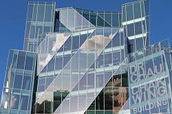 Dr Chau Chak Wing Building's glass curtain wall and name
