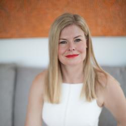 Woman in white dress smiling