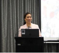 Lalo Mango speaking at a conference