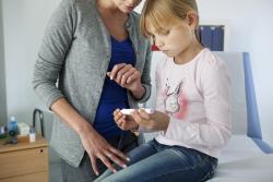 Mother and child in diabetes clinic