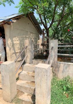 Stone stairs leading to water pump