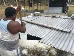 Man tending to rural water installation