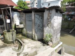 Outdoor toilets near a river