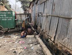 Two children playing in a polluted area