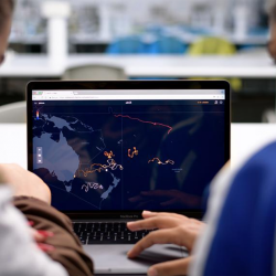Viewing a map of the earth on a laptop
