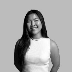 Black and white head-and-shoulders shot of Hannah Seeto against a neutral background