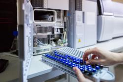 Test tubes being loaded into a machine