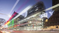 Long exposure image of UTS Tower, Central, and Building 11 at night.