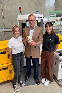 Jessica Wind, Chloe Amaro with Bob Carr holding 3DMorphic’s vertebrae model