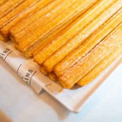 Close up of a plate of churros at the UTS Engineering and IT Think Global Fair