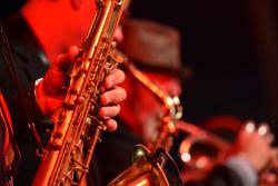 Image of fingers playing the saxophone