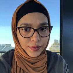 Woman wearing headscarf and glasses