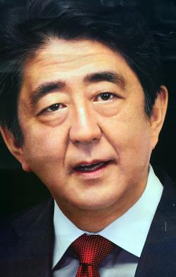 Japanese Prime Minister Abe Shinzo on a political campaign poster in Hachioji, Japan, July 2016 (Attila Jandi / Shutterstock)