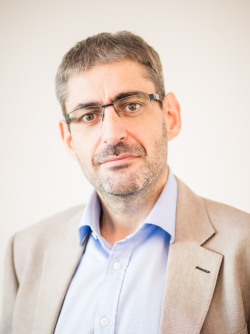 Portrait shot of Marco Navone smiling to camera