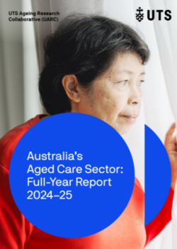 Older woman looking through white curtains