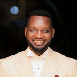 Dominique Savio headshot