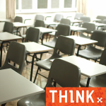 Classroom of empty chairs and desks