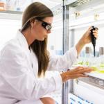 Woman pipetting liquids