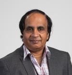 Chest up image of Saravanamuth Vigneswaran looking at the camera