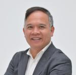 Chest up image of Tien Vinh Nguyen looking at the camera