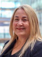 Blonde woman in a blue suit